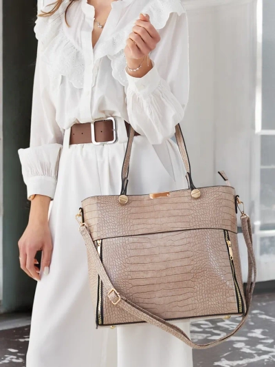 Royalfashion Lacquered handbag with embossing