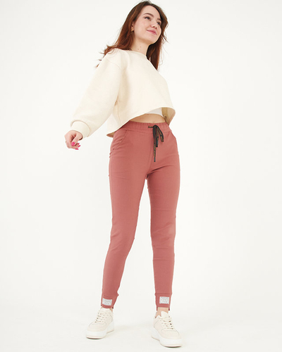 Women's coral fabric trousers with patches - Clothing