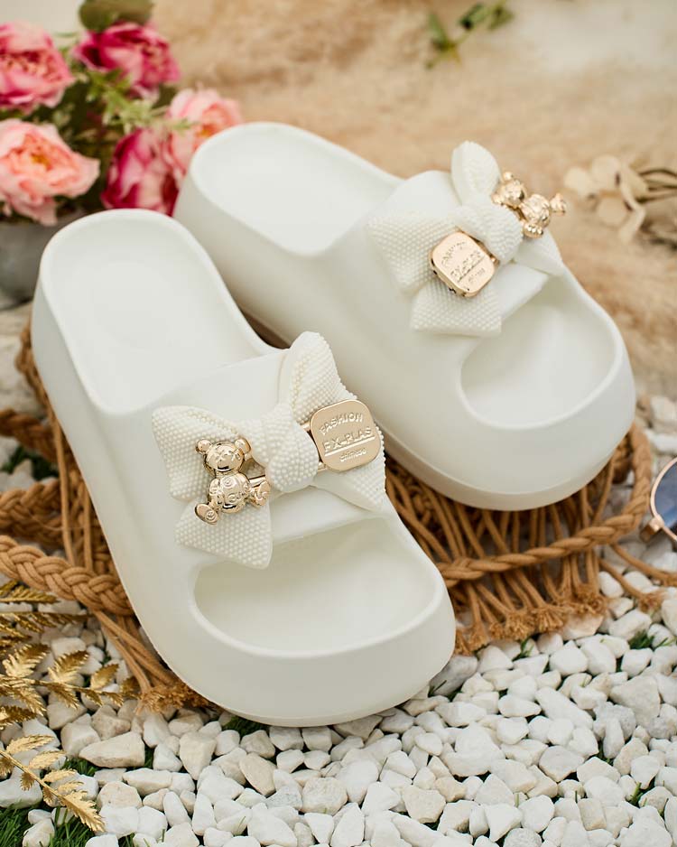 Royalfashion Women's rubber flip-flops with decorative bow Afeen