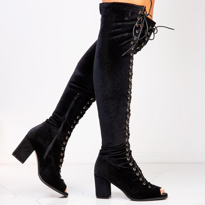 Black boots on a Ramoni post - Footwear