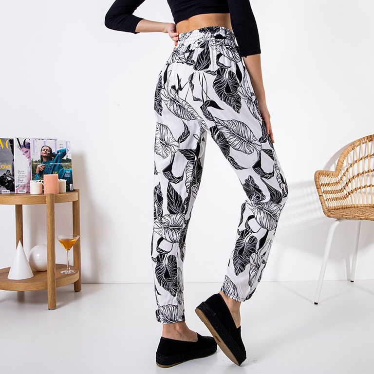White women's pants with a floral pattern - Clothing