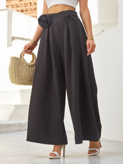 Royalfashion Elegant wide women’s trousers with a decorative flower at the belt