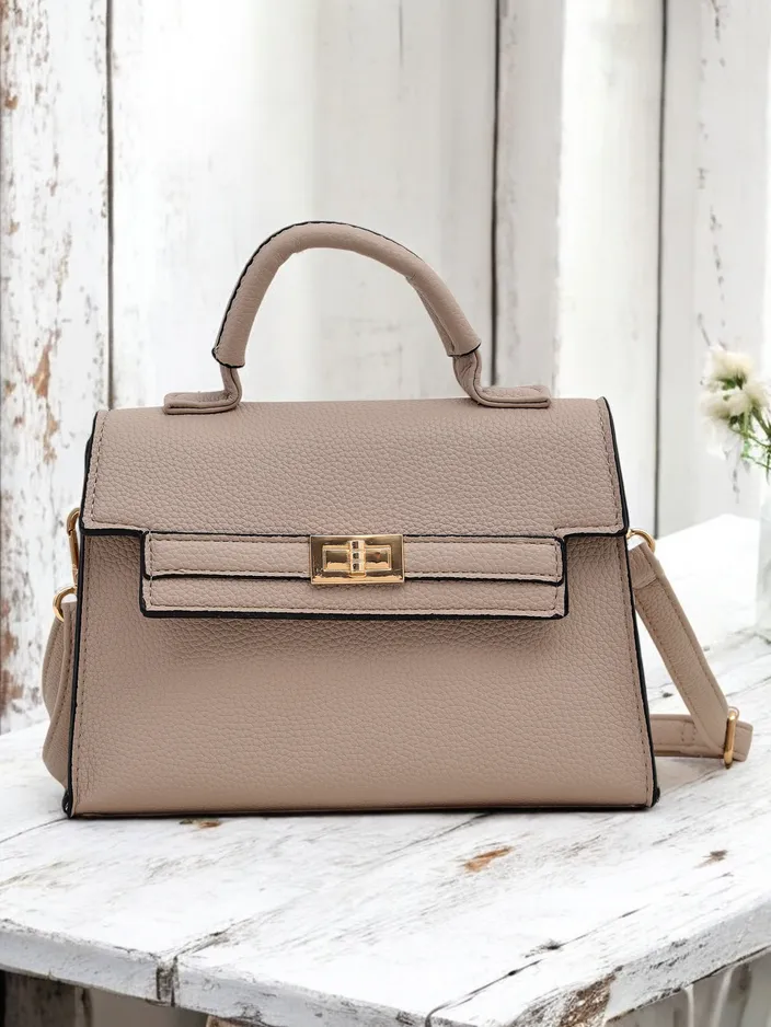 Royalfashion Elegant small handbag for women, type: handbag. Elegant, small handbag for women, equipped with a magnetic closure. It features a detachable, adjustable strap, allowing for comfortable wearing in various ways. Perfect for evening outings or s