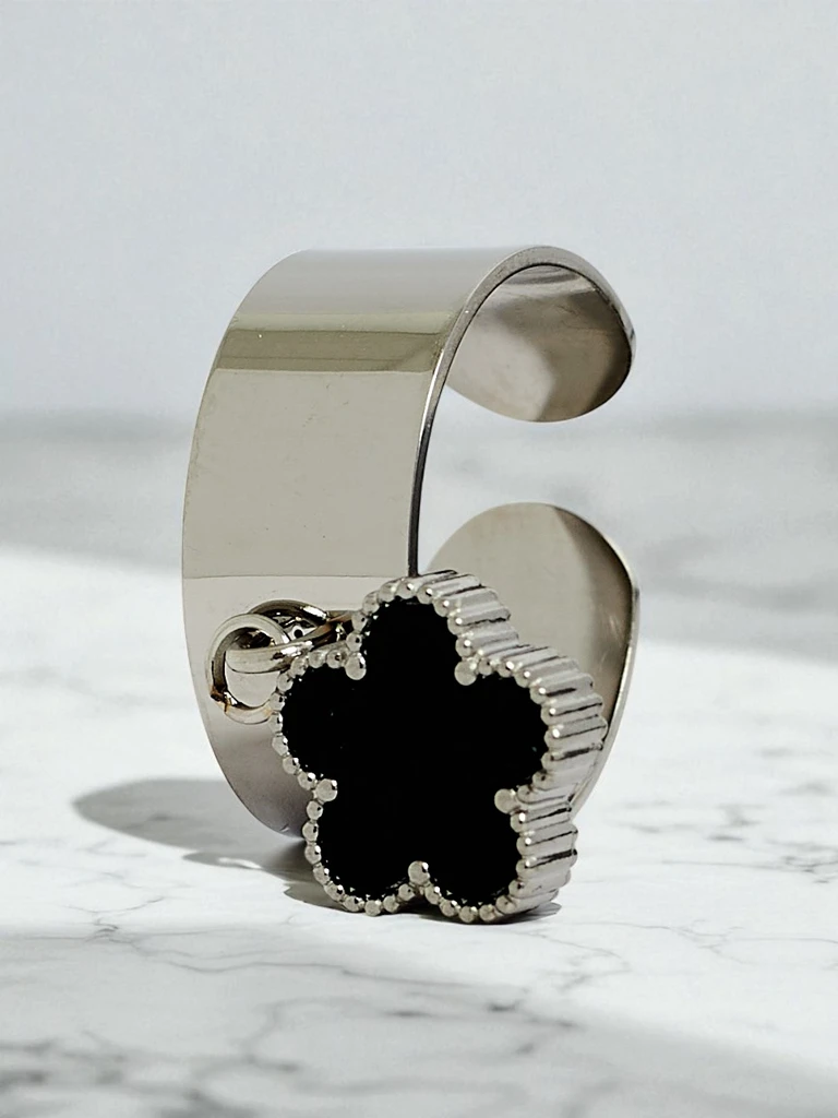 Dolce Vita bangle bracelet with decorative charms