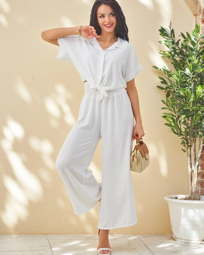 Royalfashion Женский комплект с завязанной короткос sleevesрубашкой и расклешенными брюками с стразами