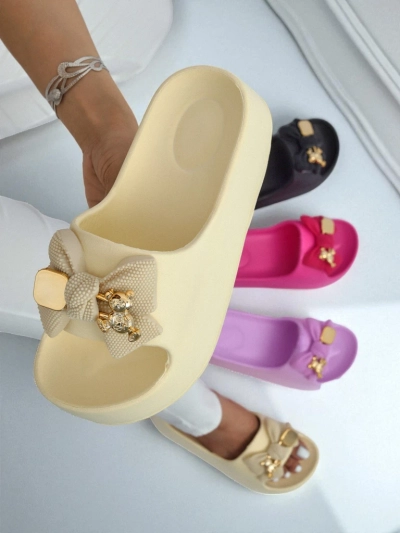Royalfashion Women's rubber flip-flops with a decorative bow Alday