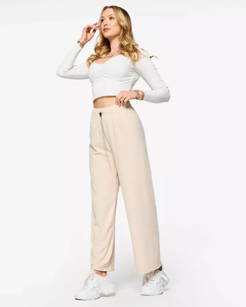 Beige women's wide ribbed pants - Clothing