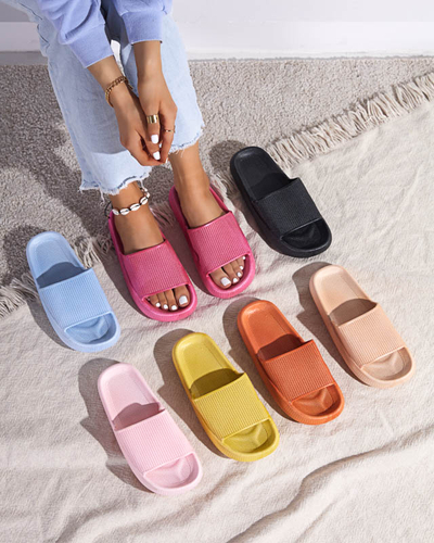 Green rubber slippers with Torika embossing - Footwear