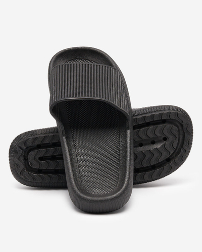 Black rubber slippers with Torika embossing - Footwear