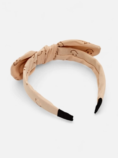 Royalfashion Children's headband with a bow with a smiley face print