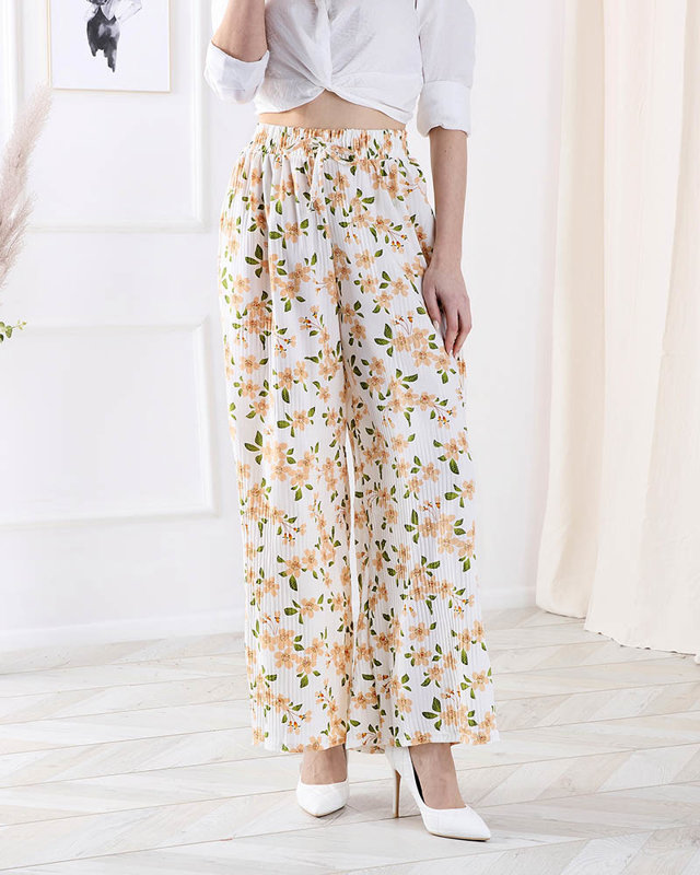 Женские белые брюки из ткани с цветочным рисунком - Одежда