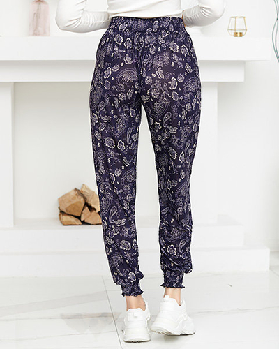 Beige and navy blue women's trousers with print - Clothing