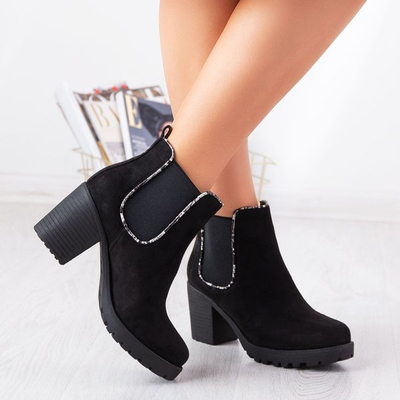 Black boots on a higher post Travolte - Footwear