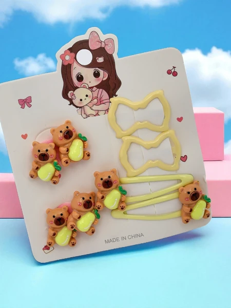 Matu sprādžu komplekts ar lāča un lentes motīviem