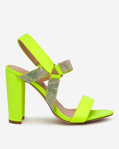 Neon yellow women's sandals on the Xiobi post. Footwear