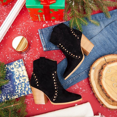 Black cowboy boots on a high Gana post - Footwear