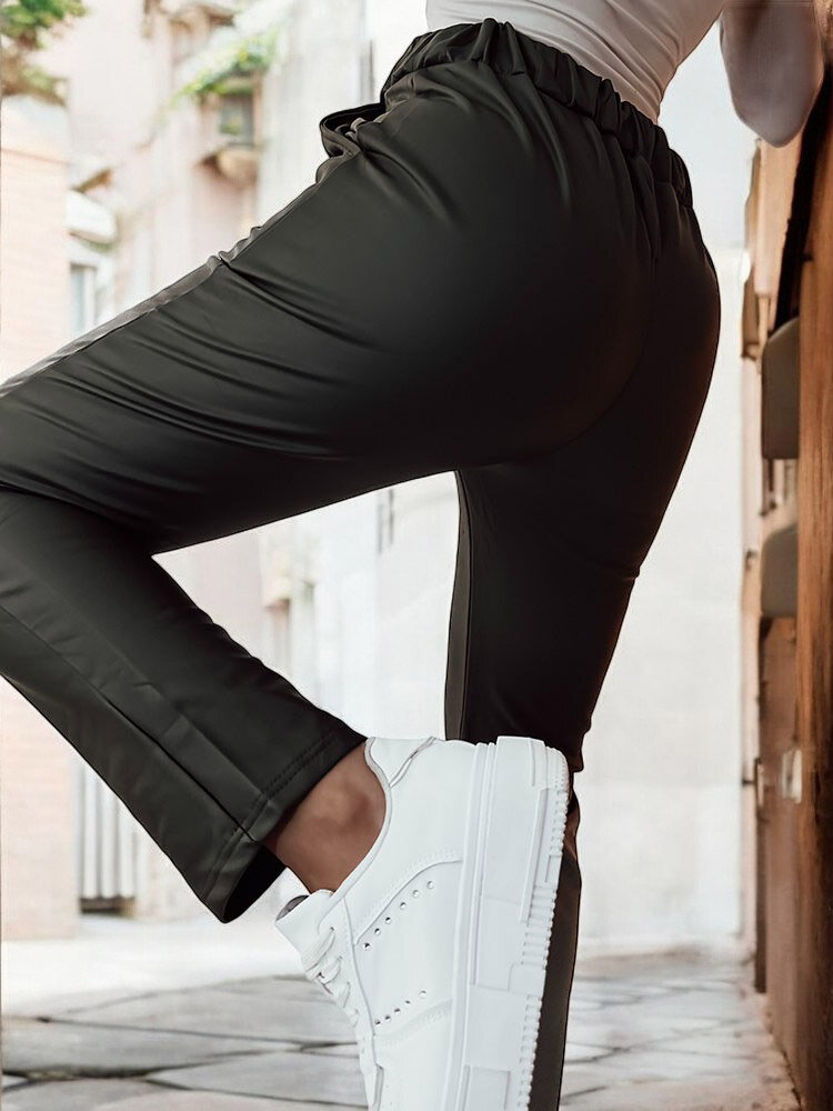 Royalfashion Sieviešu eko ādas bikses tumši zaļā krāsā