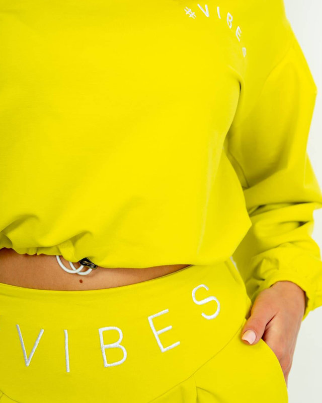 Dzeltens sieviešu sporta treniņtērpa komplekts ar crop top džemperi - Apģērbs