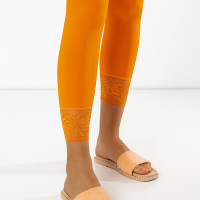 Orange women's leggings with lace - Clothing