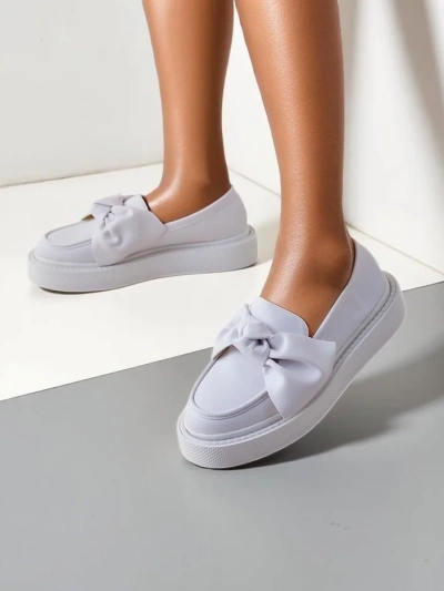 Royalfashion Elegant women's moccasins with a bow Ortto