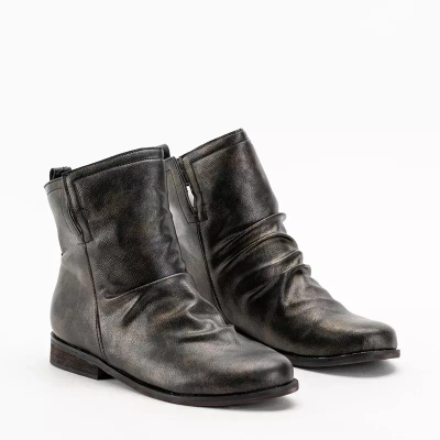 OUTLET Black and gold women's boots from Jetissaa. Footwear