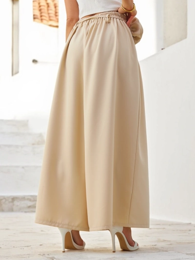 Royalfashion Elegantas platās sieviešu bikses ar dekoratīvu ziedu jostasvietā