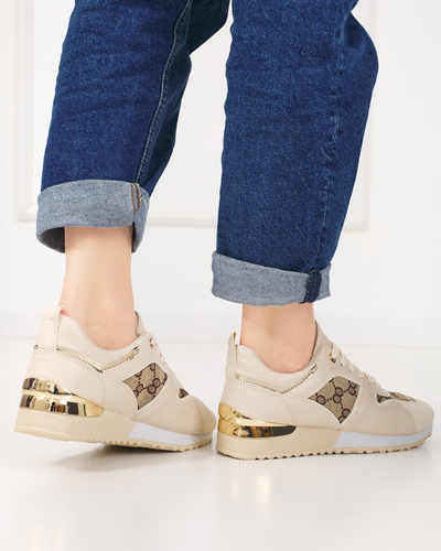 OUTLET Beige women's sports shoes with Engla print - Footwear