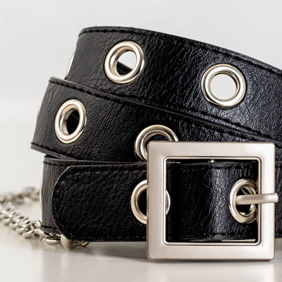 Ladies' black narrow belt with eyelets - Accessories
