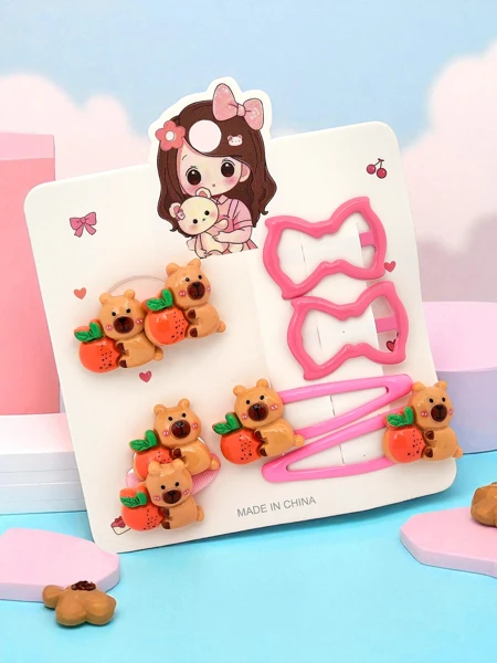Set of hair clips with bear and bow motifs
