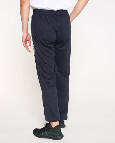 Navy blue men's sweatpants with inscriptions - Clothing