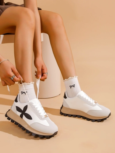 Спортивные кроссовки Royalfashion для женщин на толстой подошве Aloqa