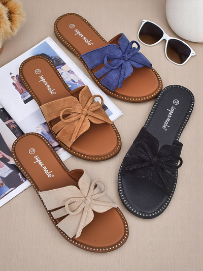 Royalfashion Women's flat sandals with a bow Gerber