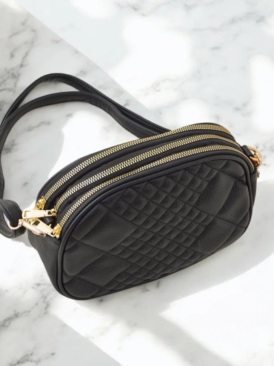 Royalfashion Small oval women's handbag made of eco leather