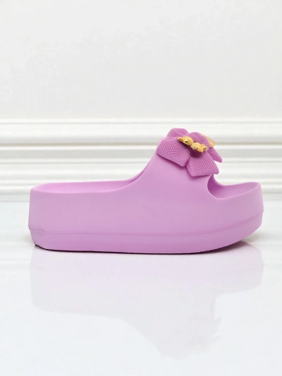 Royalfashion Women's rubber flip-flops with a decorative bow Alday