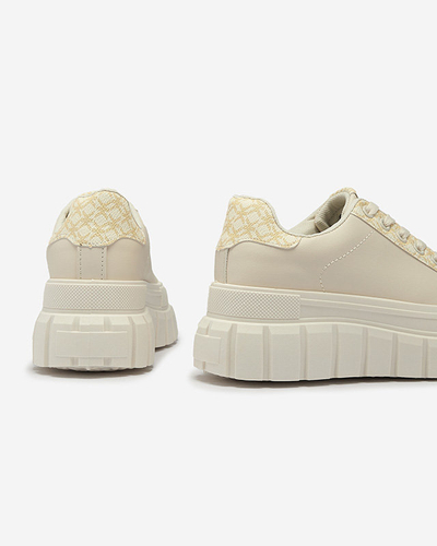 Casual women's cream women's sports shoes with patterned inserts Leritic - Footwear