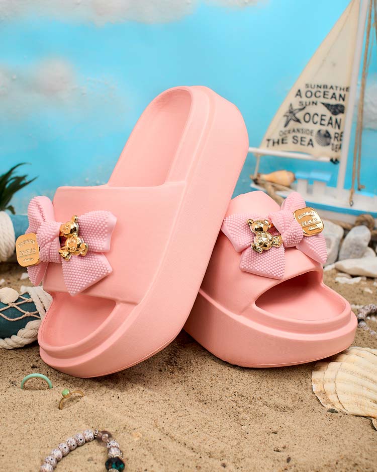 Royalfashion Women's rubber flip-flops with decorative bow Nilm