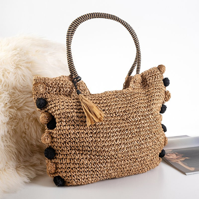 Женская плетеная сумка в коричневом цвете