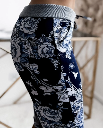 Royalfashion Navy blue women's 3/4 shorts with floral pattern PLUS SIZE