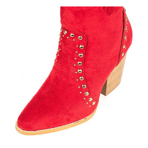 Red cowboy boots on a high Gana post - Footwear