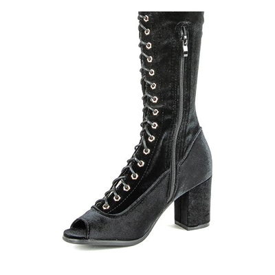 Black boots on a Ramoni post - Footwear