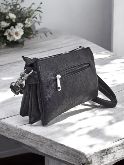 Royalfashion Small women's handbag made of eco leather with 3 compartments