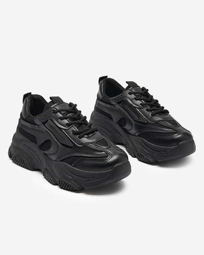 Black women's sports shoes on a massive Okis sole - Footwear