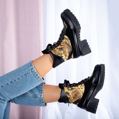 Black snakeskin imitation bags on a pole - Footwear