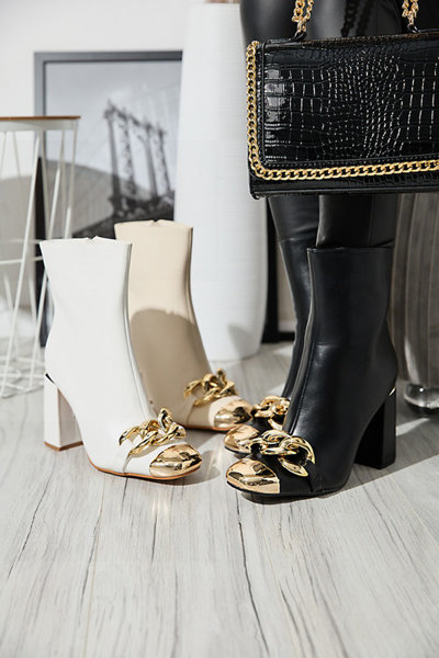OUTLET Melni sieviešu augstpapēžu zābaki ar zelta rotājumiem Amiop- Footwear