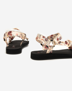 OUTLET Sieviešu melnas sandales ar smilškrāsas ziedu svītrām - Apavi