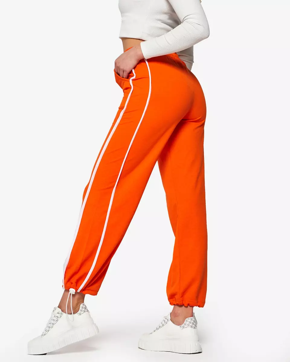 Sieviešu oranžās platās treniņbikses ar svītrām - Apģērbs
